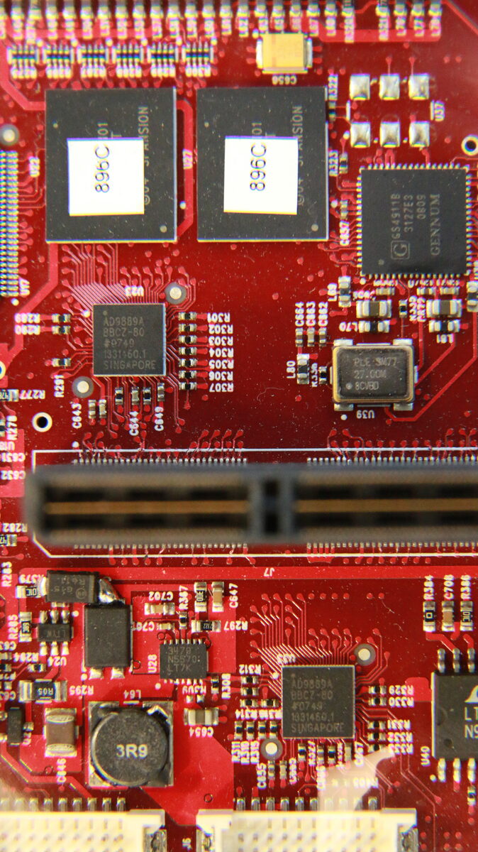 CPU_IO board showing dual DDR memory modules and the mezzanine connector running horizontally