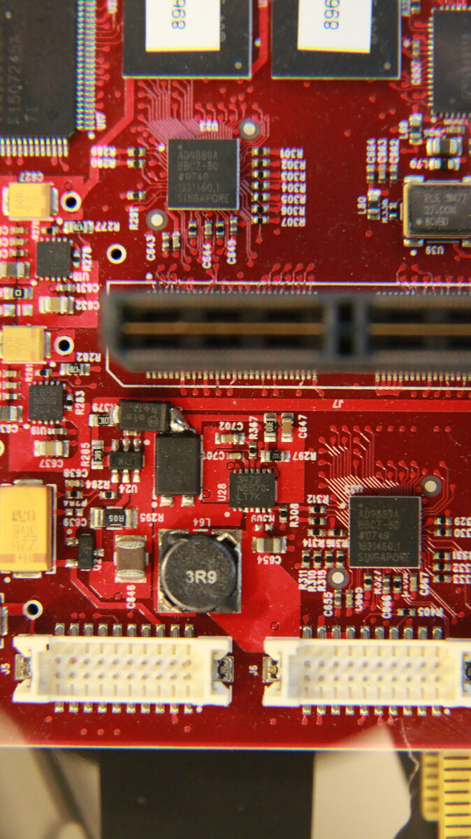CPU_IO board wider angle showing full mezzanine connector and AUDIO_PCI board below